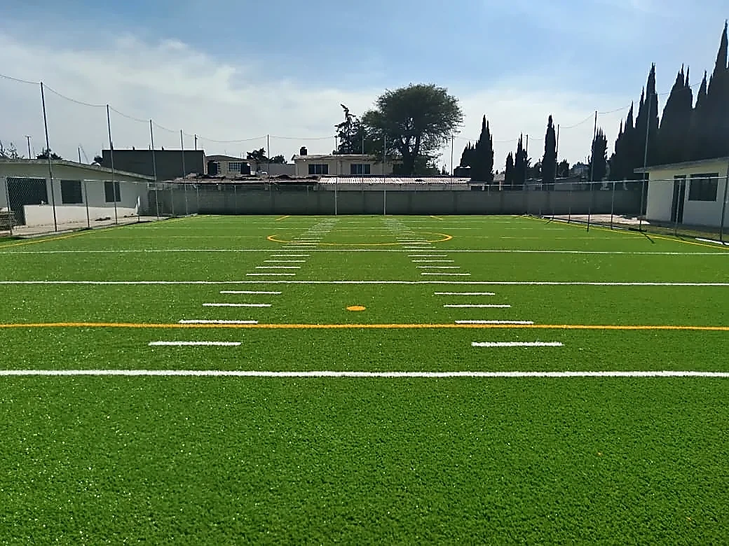 Cancha de tochito con pasto sintético en San Sebastián, Zumpango, Estado de México: otra vista de la cancha