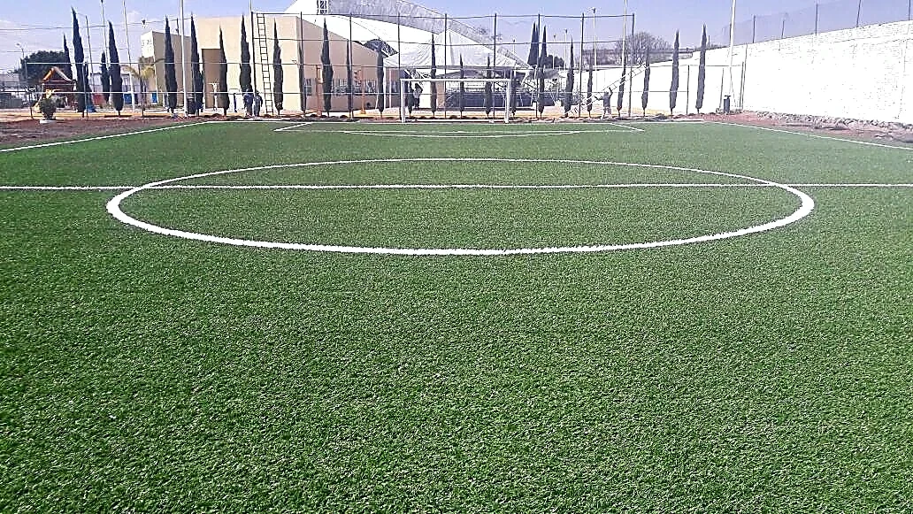 Cancha de fútbol 7 con pasto sintético en Centro Integral de Prevención y Participación Ciudadana, Puebla