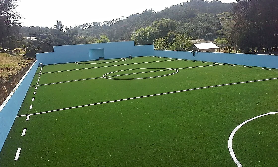Cancha de fútbol rápido con pasto sintético en Teotlalco, Puebla